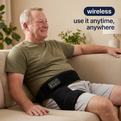 Wireless hip therapy belt — use it anytime, anywhere, man relaxing on couch